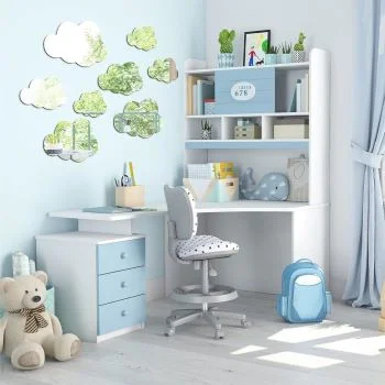 Nine cloud-shaped acrylic mirror wall stickers arranged on a light blue wall in a kids’ room.